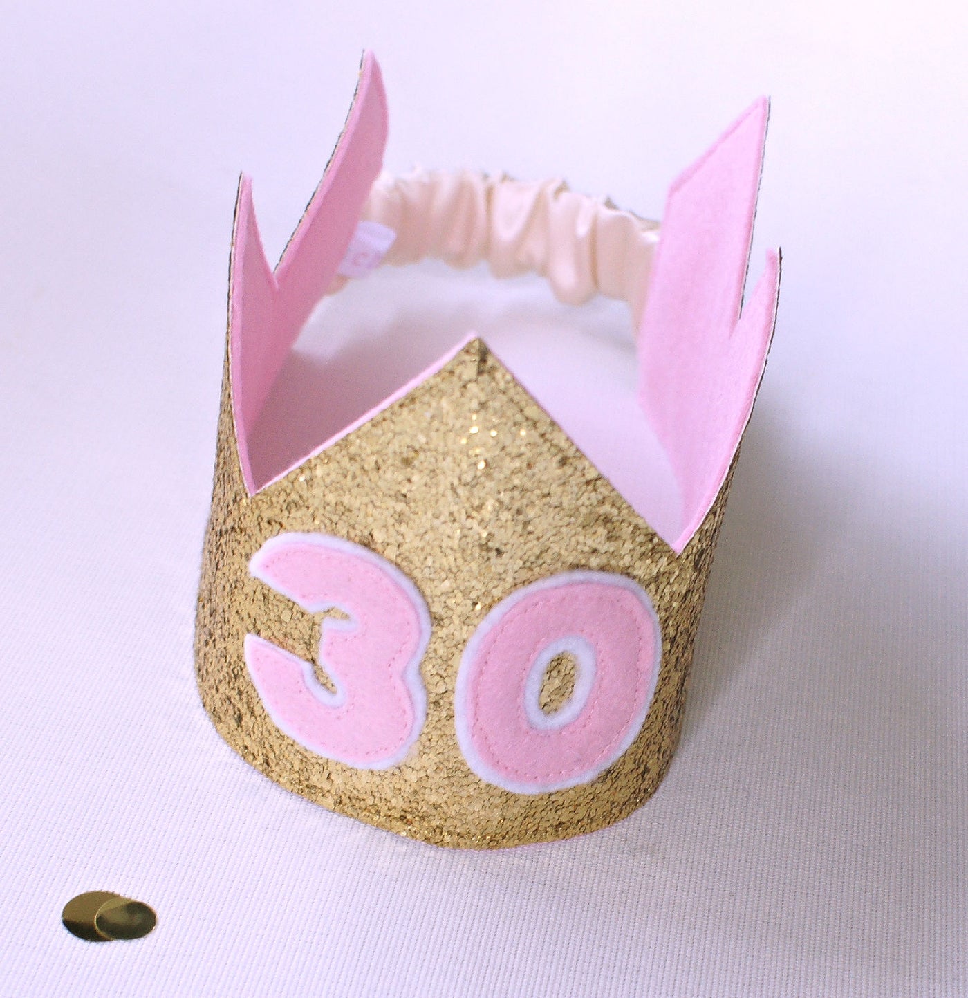 Gold glitter 30th birthday crown with light pink felt backing 