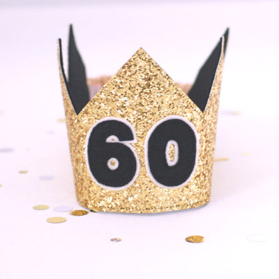 60th birthday crown in gold glitter, with a black felt number 60 on the front