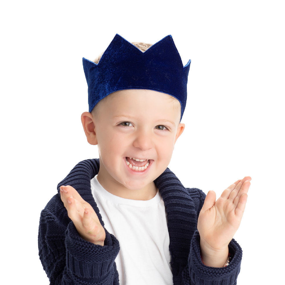 boy wearing blue velvet birthday crown front view