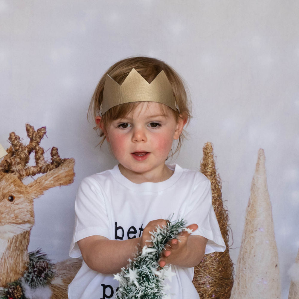 fabric crown in gold - being worn for a christmas photoshoot by a young boy
