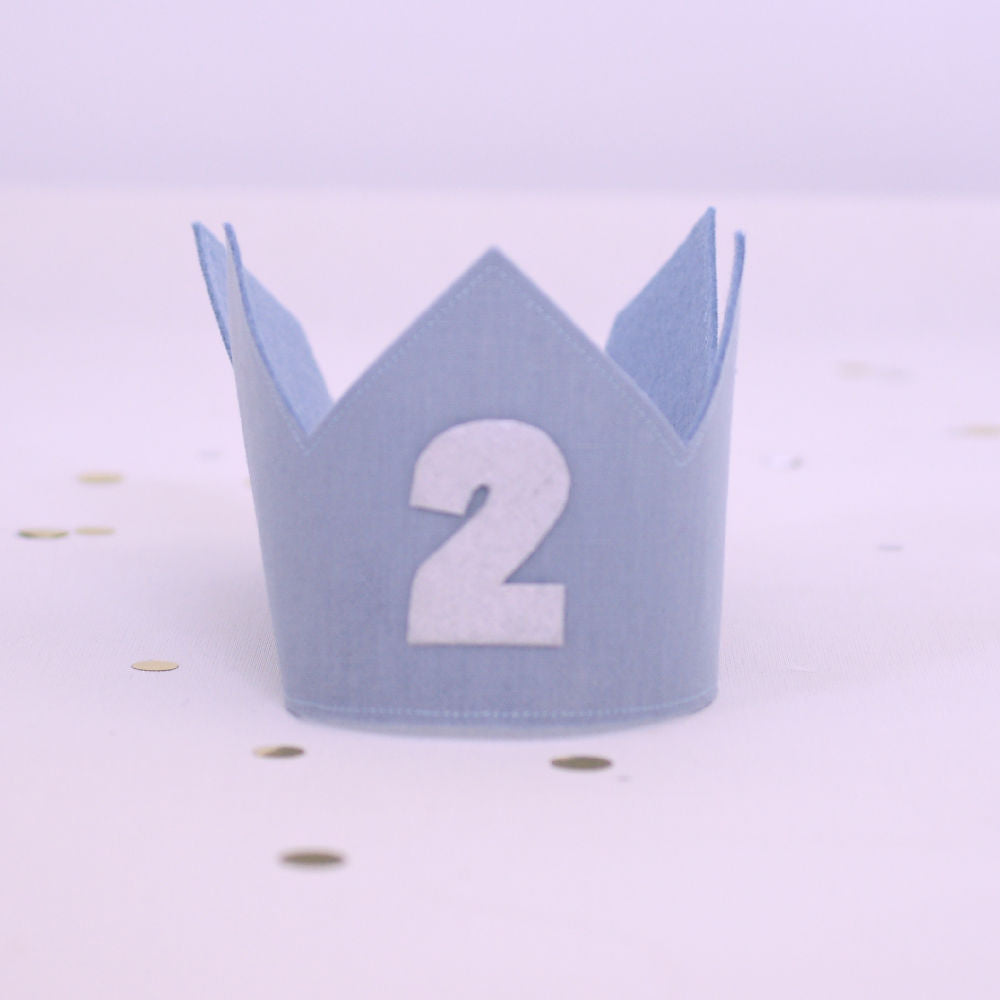blue second birthday crown in blue linen and silver 2 on the front