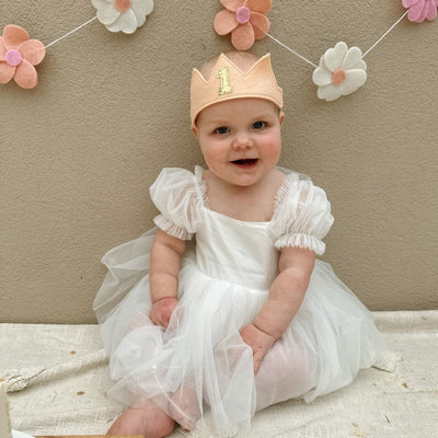 peach felt birthday crown for a first birthday party or photoshoot